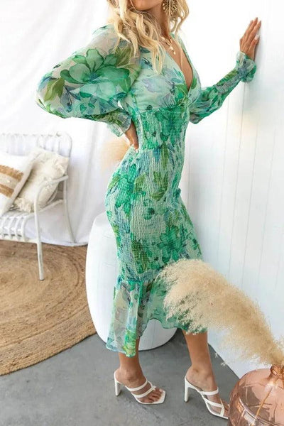 Melissa | Abito midi con volant floreali